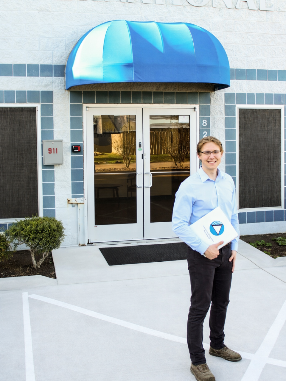 photo of nikolas magill standing in front of Avanti HQ